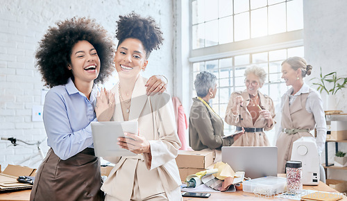 Image of Teamwork, tablet and laugh with a business black woman and colleague joking in their office for design. Collaboration, fun and creative with designer female friends working in a creative workshop