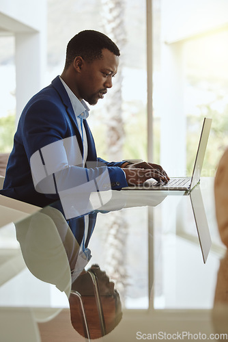 Image of Email, business and black man planning on a laptop, internet research and reading information for work. Corporate, executive and African businessman typing on pc for connection with table reflection