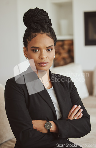 Image of Portrait, black woman and leader arms crossed, manager and serious look in office. African American female, ceo or entrepreneur for business, employee and corporate deal for company, career or vision