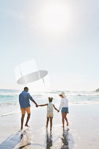 Image of Beach vacation and couple with child walking in water while holding hands together with love in summer from the back. Nature, ocean and blue sky, black family on tropical island holiday in Maldives.