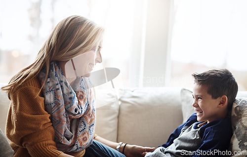 Image of Love, mother and son on sofa, playing and bonding on weekend, loving and relax in living room. Mama, boy and male child connecting, playful and smile on break, motherhood and kid on couch in lounge