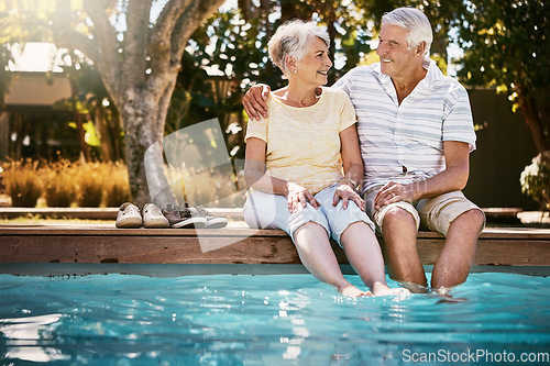 Image of Senior couple, hug and swimming pool for holiday in relax for love or quality bonding time together on summer vacation. Happy elderly man holding woman relaxing with feet in water by the poolside