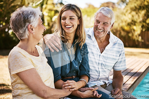 Image of Family, senior parents and woman by pool holding with care, love and hug bonding outdoor. Smile, happy person and people in retirement with adult daughter together with bokeh in nature in summer