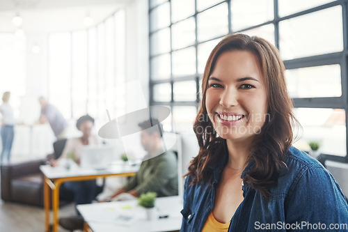 Image of Creative business woman, leader and smile for management, career or vision at the office. Portrait of a young designer standing and smiling in happiness for job, goals or startup at the workplace