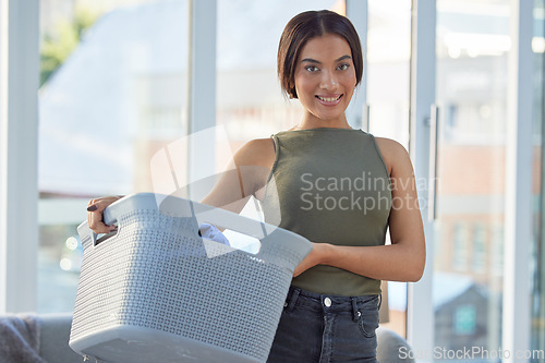 Image of Laundry, basket and portrait of black woman with clean fabric clothes at home. Happy female cleaner, container and washing textile linen, spring cleaning and housekeeping maintenance in apartment