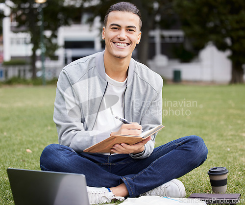 Image of Study, laptop and student portrait in park writing at university, college or campus for research, planning schedule and scholarship. Happy man relax and learning with technology and notebook for exam