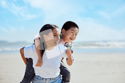 Image of Mom, beach piggyback and asian kid with interracial family bonding, nature and outdoor vacation in sunshine. Happy family, ride and black woman for adoption, love and adventure by ocean on holiday