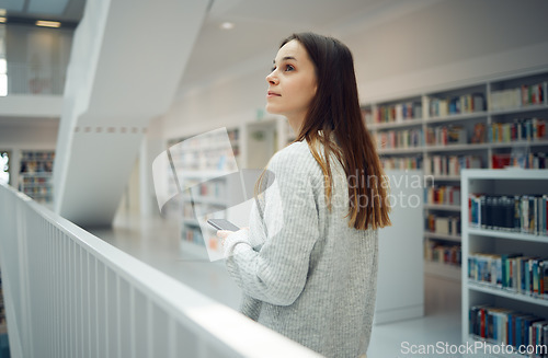 Image of Library, thinking student and woman with phone in university, college or school. Ideas, scholarship and female with mobile smartphone for knowledge, researching or studying, learning and education.