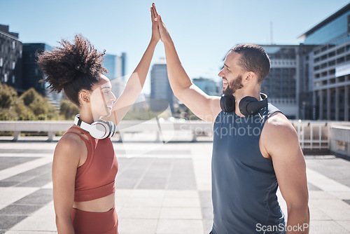 Image of Fitness high five, success and couple in the city, cardio training and motivation for workout. Support, achievement and runner man and woman excited about exercise, goal and target in France