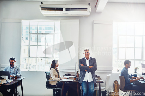 Image of Man, leader and office portrait with staff, happy and confident smile with arms crossed for success. Senior manager, leadership and focus for corporate teamwork, group cooperation or marketing vision