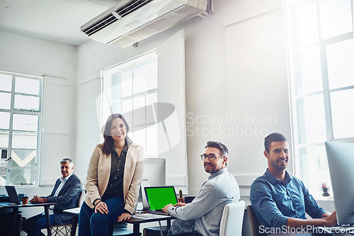 Image of Laptop green screen, teamwork and portrait of business people in office. Collaboration, mockup product placement and group of employees with computers planning marketing, advertising or sales project