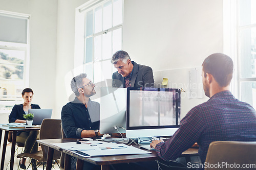 Image of Coaching, training and business people with computer in office. Leadership, teamwork and collaboration of employees and mature men on pc working on advertising, marketing or sales project in company.