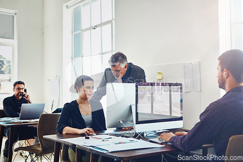 Image of Office, coaching and business people training with computer. Mentor, teamwork and collaboration of employees, woman and mature man on pc working on advertising, marketing or sales project in company.