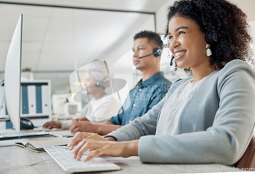 Image of Black woman, call center consultant and contact us with CRM and happy employee at desk with keyboard and computer. Communication in customer service or telemarketing with tech support and online.