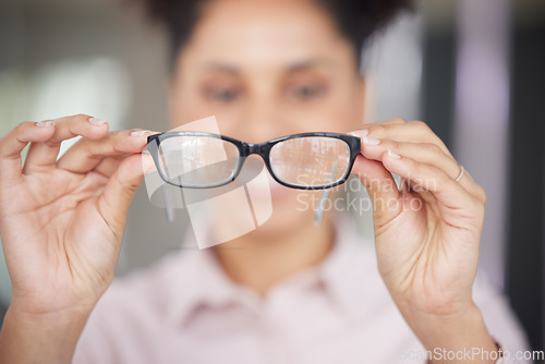 Image of Glasses, vision and hands with a black woman customer in an eyewear store for prescription lenses. Fashion, retail and spectacles with a female consumer buying a frame for eyesight at an optometrist