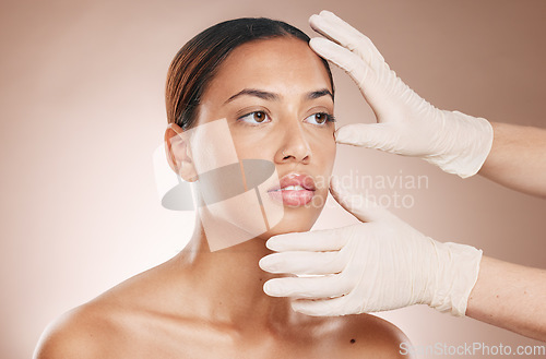 Image of Rhinoplasty, hands and woman consulting for face botox, beauty implant or makeup cosmetics. Facial consultation, skincare and plastic surgery for aesthetic change from body laser on studio background