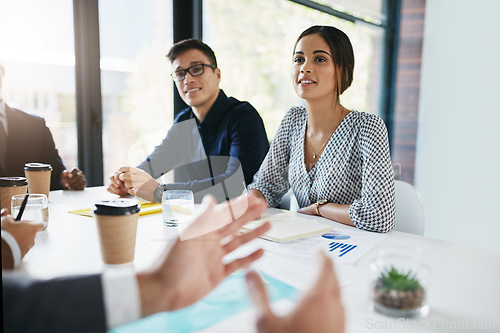 Image of Business people, meeting and discussion for team planning, analysis or brainstorming ideas at the office. Group of employee workers in conversation, teamwork or collaboration for corporate goals