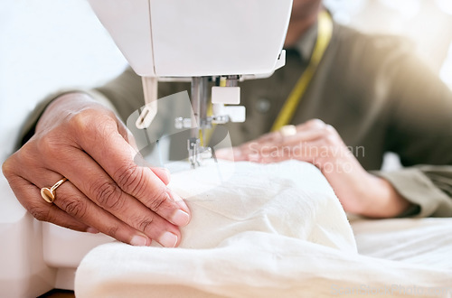 Image of Tailor, woman hands and sewing machine for clothes fabric, luxury apparel or creative design in studio workshop atelier. Startup small business designer, service and sewer working on fashion outfit