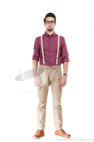 Image of Portrait, nerd and man serious, fashion and glasses with young person isolated on white studio background. Gentleman, male and hipster with funky outfit, smart guy and suspenders with confidence
