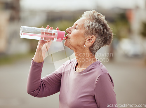 Image of Fitness, runner or senior woman drinking water with sports goals resting or relaxing on break. Healthy, tired or thirsty elderly lady drinks natural liquid in cardio workout, training or exercise