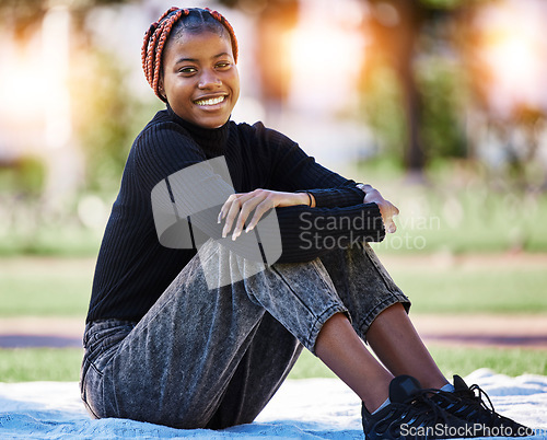 Image of Black woman, portrait or relax on campus park, nature garden or environment field in college, university or school study. Smile, happy student or graduate with learning goals or education scholarship