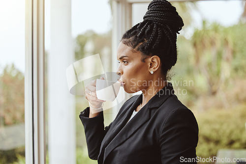 Image of Thinking, coffee and professional black woman by window preparing or planning mental ideas for meeting. Corporate, smart and African female business manager contemplating while drinking warm beverage