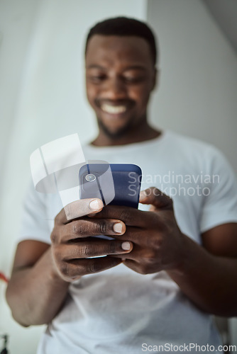 Image of Smartphone, news and happy black man with loan application, credit score check or bank feedback and reading email on mobile app. Smile, communication and african man at home using phone or cellphone