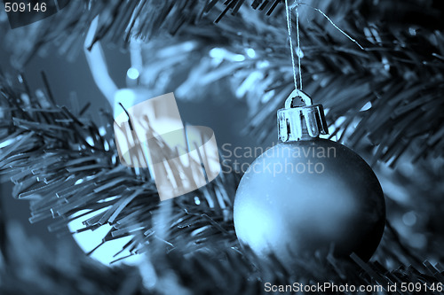 Image of Christmas ornaments on tree.