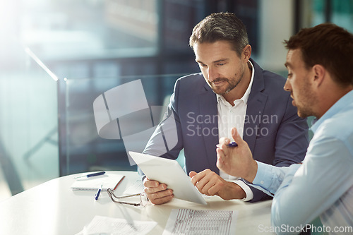 Image of Tablet, teamwork and business people talking in office workplace. Collaboration, technology and workers, men or employees with touchscreen planning sales, marketing or advertising strategy in company