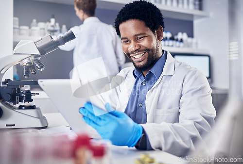 Image of Scientist, research and black man with tablet, laboratory and innovation for healthcare, online schedule or tech. African American male, researcher and digital planning for medical diagnosis and cure