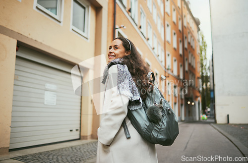 Image of Back, woman and excited for travel, smile and relax for vacation, summer and town. Young female, student exchange or backpack for tourism, happiness or holiday for break, road trip or freedom in city