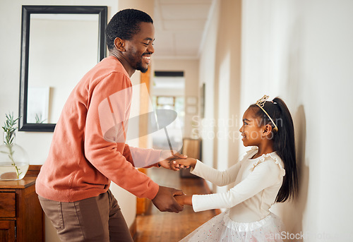 Image of Dance, happy and ballet with father and daughter holding hands for learning, support and bonding. Princess, teaching and music with dad and girl in black family home for freedom, wellness and helping