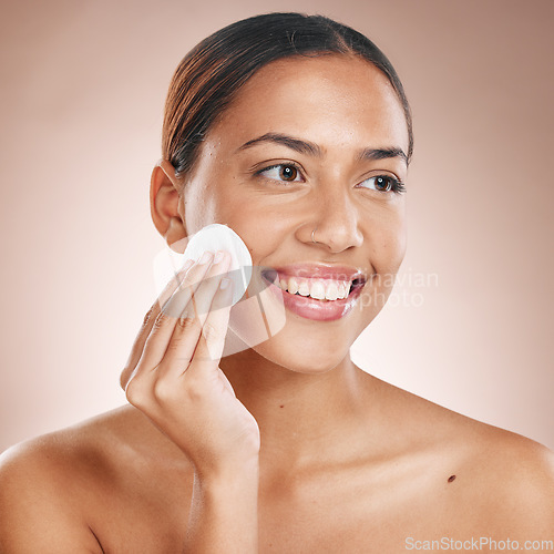 Image of Cotton pad, skincare and woman with face beauty, facial treatment wellness and happy cleaning with skincare mockup. Skin, natural cosmetics and makeup removal, cosmetic care against studio background