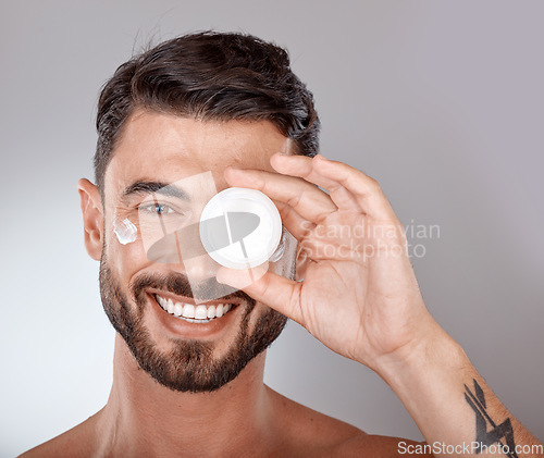 Image of Beauty, skincare and portrait of man with cream on gray background for wellness, spa treatment and hygiene. Cosmetics, grooming and face of male model with lotion, self care and facial treatment