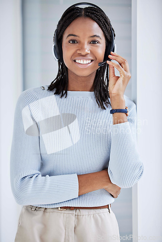 Image of Black woman, portrait or customer support headset in telemarketing office, call center company or b2b sale business. Smile, happy face or contact us consultant in CRM deal or communication technology