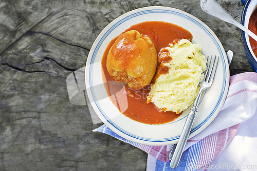 Image of Stuffed peppers in tomato sauce