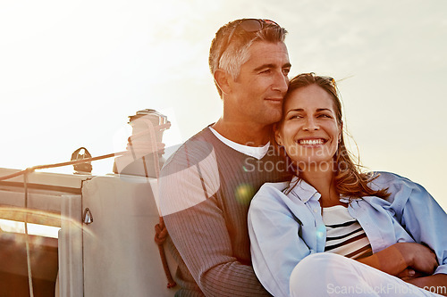 Image of Travel, investment and luxury with couple on yacht for success, relax and wealth on retirement trip. Travel, love and ship hobby with baby boomers man and woman sailing on boat for tropical vacation