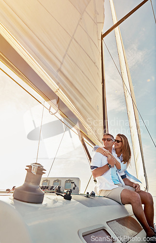 Image of Travel, investment and luxury with couple on yacht for success, relax and wealth on retirement trip. Rich, love and ship hobby with baby boomers man and woman sailing on boat for tropical vacation