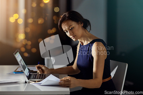 Image of Documents, night and business woman reading feedback review of financial portfolio, stock market or investment. Economy research, bitcoin mining infographic and trader trading nft, forex or crypto