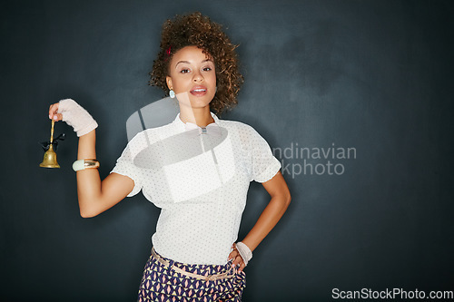 Image of Black woman, fashion portrait and ring bell with mockup blackboard space for hospitality or waitress. Female model with vintage brass teacher object for advertising sale product placement or service