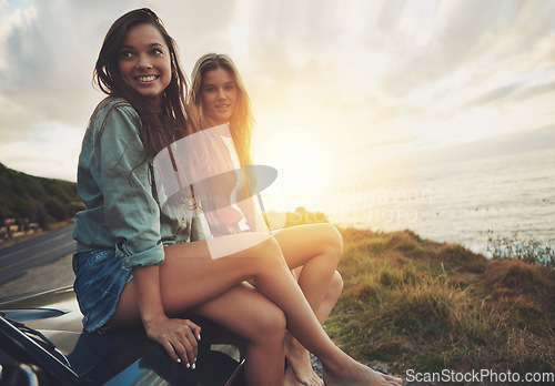 Image of Friends at sunset, women on car with travel to beach, road trip portrait and outdoor with nature and sea holiday. Adventure mockup, freedom and gen z youth on summer vacation, happy with lens flare