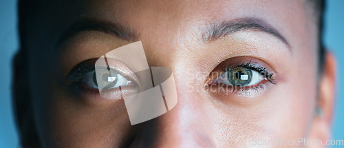 Image of Woman, face and eyes looking for biometrics, optics or vision in the future for scanning identity. Closeup of female eye in focus for scan, cyber security or facial recognition with optical iris