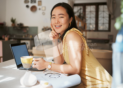 Image of Asian woman, laptop and portrait for business happiness with coffee in ceramics workshop, artist studio or success vision. Woman, creativity office and planning strategy on digital tech in morning