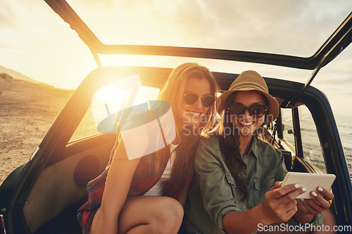 Image of Women friends, selfie and car on vacation, beach and sunset on social media app with smile by waves. Woman, smartphone and outdoor in suv, ocean holiday or road trip for summer sunshine on internet