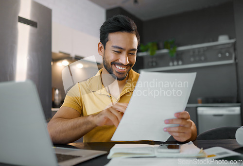 Image of Planning, smile and Asian man with paperwork and a laptop for finance budget, entrepreneurship and tax. Happy, summary and freelancer reading the proposal of a project, financial deal or report