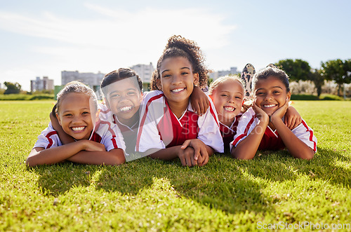 Image of Soccer children team, portrait or happy for success, goal or wellness in match, game or competition with smile on field floor. Motivation, sport or kids in training, workout for teamwork exercise