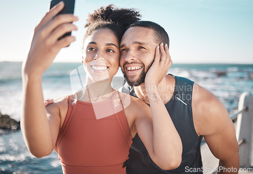 Image of Black couple, fitness and happy selfie on beach for social media, sports exercise and support motivation. Athlete woman, man and happiness together for smartphone photography by ocean sea outdoor