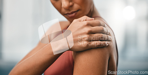 Image of Closeup, fitness and black woman with shoulder pain, muscle ache and strain after training, workout and inflammation. African American lady, female and athlete with sports accident, torn and bruised