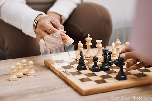 Image of People, playing hands or chess knight on house, home or living room table in strategy board game, checkmate vision or contest. Zoom, women or competition friends and chessboard pawn in mind challenge