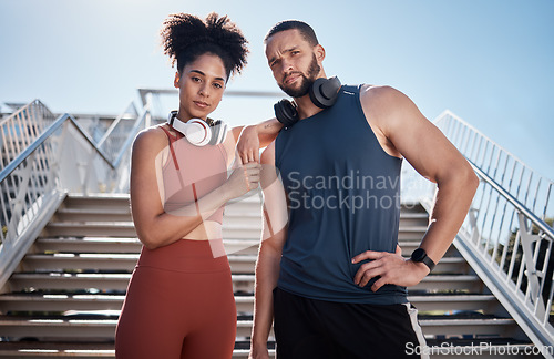 Image of Black couple, stairs portrait and exercise in city for goals, motivation and urban outdoor workout with music. Couple teamwork, fitness and support for health, wellness and training in Cape Town sun